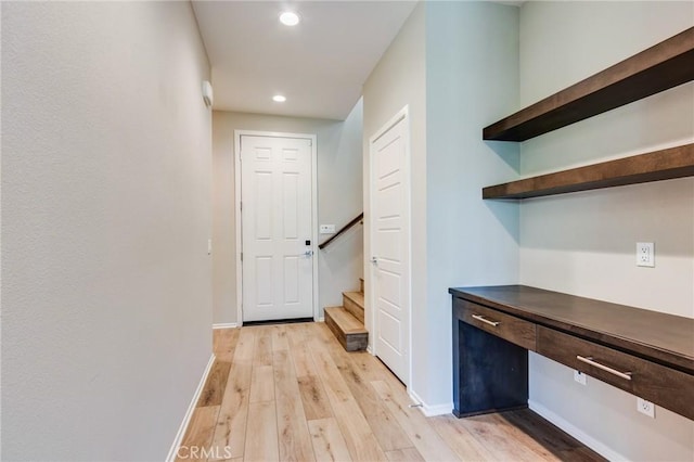 13139 Upland Ct, Hesperia, CA 92344 - corridor with light wood-type flooring, an office area, recessed lighting, stairs, and baseboards