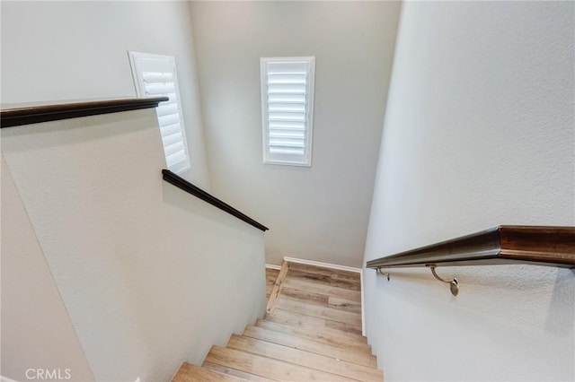 13139 Upland Ct, Hesperia, CA 92344 - stairs featuring wood finished floors