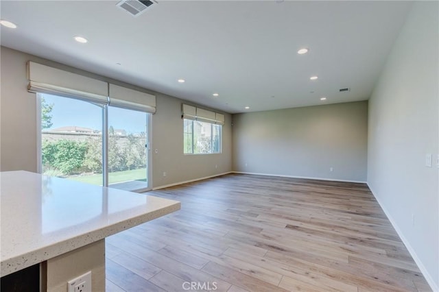 13139 Upland Ct, Hesperia, CA 92344 - empty room featuring light wood-style floors, baseboards, and recessed lighting