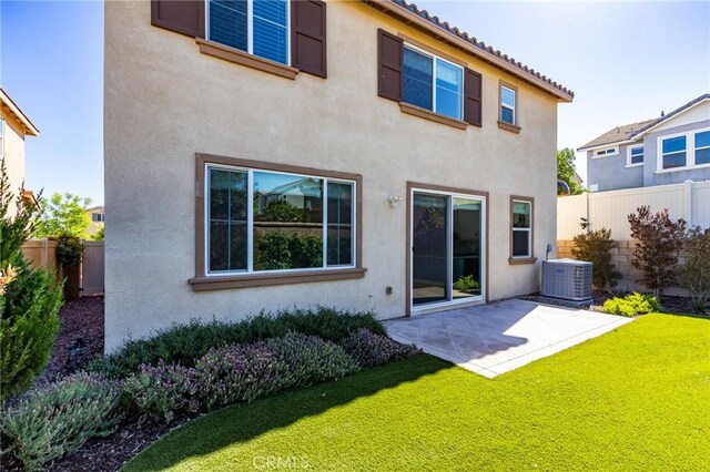 13139 Upland Ct, Hesperia, CA 92344 - back of property featuring stucco siding, central AC, and a patio