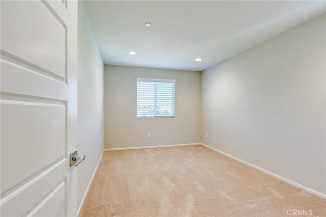 13139 Upland Ct, Hesperia, CA 92344 - unfurnished room featuring light colored carpet, recessed lighting, and baseboards