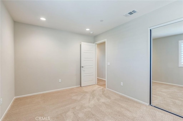 13139 Upland Ct, Hesperia, CA 92344 - unfurnished bedroom with light carpet, recessed lighting, baseboards, and a closet