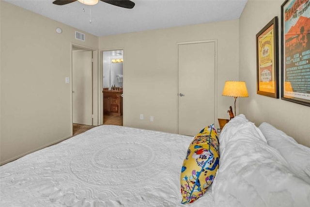1582 Lisa Ln, Redlands, CA 92374 - bedroom with ensuite bath and a ceiling fan