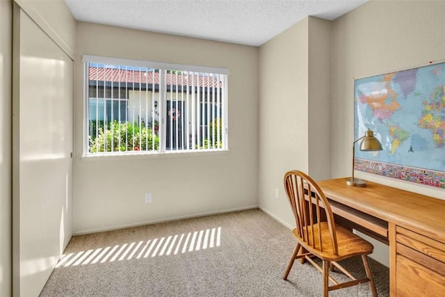 1582 Lisa Ln, Redlands, CA 92374 - carpeted home office with healthy amount of natural light, baseboards, and a textured ceiling