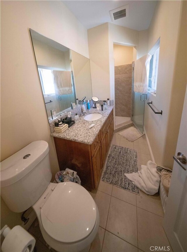 1630 Bridgeport Dr, Los Angeles, CA 90065 - full bath featuring a shower stall, vanity, toilet, and tile patterned floors