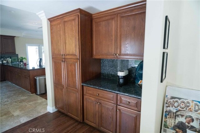 1630 Bridgeport Dr, Los Angeles, CA 90065 - kitchen with freestanding refrigerator, tasteful backsplash, brown cabinets, dark wood-style floors, and recessed lighting