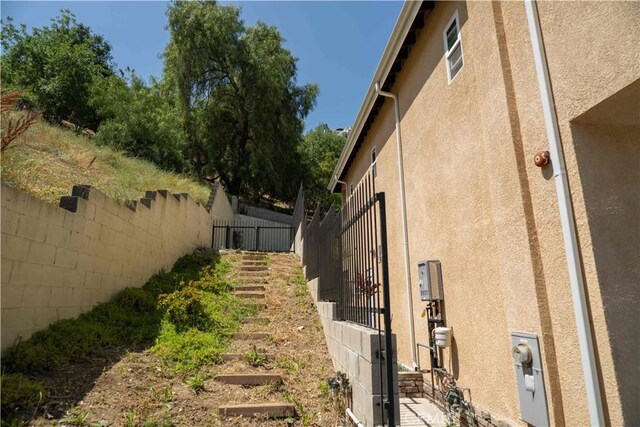 1630 Bridgeport Dr, Los Angeles, CA 90065 - view of side of home featuring stucco siding