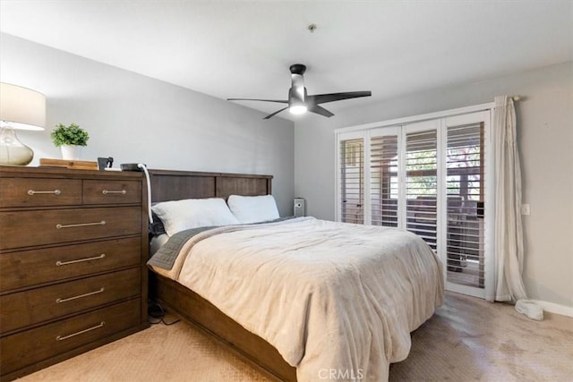 236 S Grisly Canyon Dr Unit N, Orange, CA 92869 - bedroom featuring access to outside, light colored carpet, baseboards, and a ceiling fan
