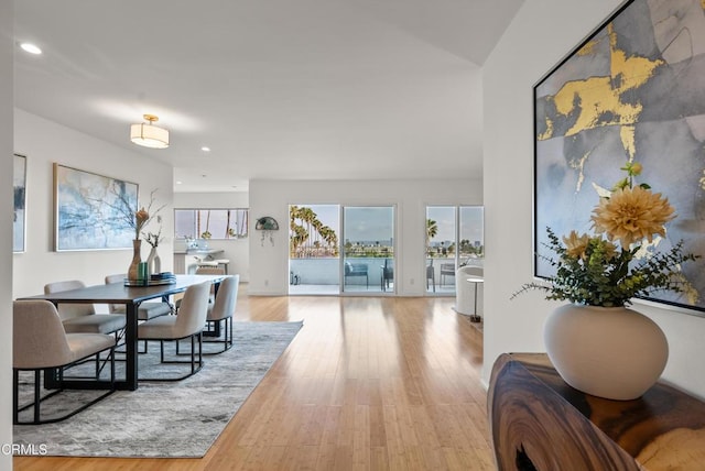 7560 Hollywood Blvd Unit 409, Los Angeles, CA 90046 - dining area with recessed lighting and wood finished floors