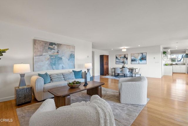 7560 Hollywood Blvd Unit 409, Los Angeles, CA 90046 - living area featuring light wood-style flooring and recessed lighting