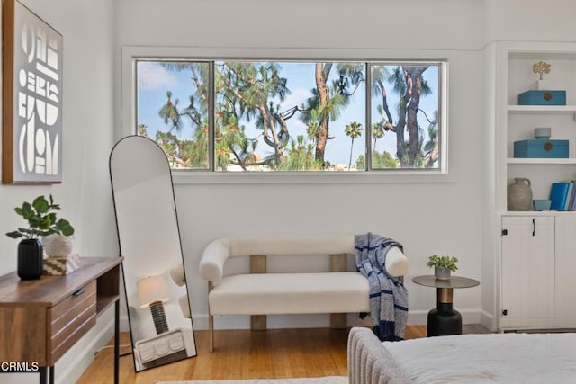 7560 Hollywood Blvd Unit 409, Los Angeles, CA 90046 - bedroom featuring multiple windows and wood finished floors