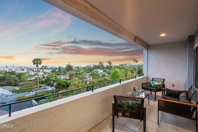 7560 Hollywood Blvd Unit 409, Los Angeles, CA 90046 - balcony at dusk with an outdoor hangout area