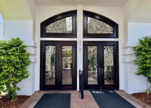 4523 Cordoba Way, Oceanside, CA 92056 - property entrance featuring french doors and stucco siding