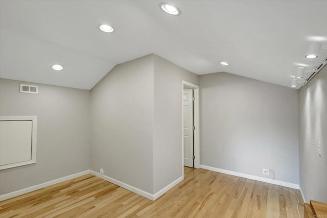4523 Cordoba Way, Oceanside, CA 92056 - additional living space with vaulted ceiling, light wood-style floors, baseboards, and recessed lighting