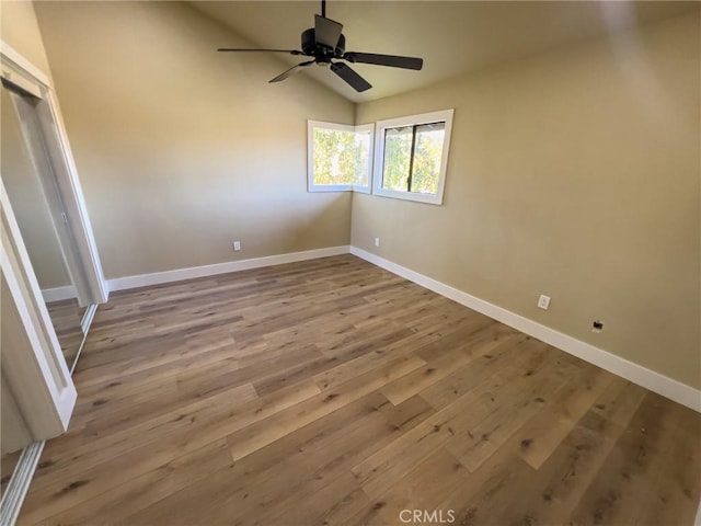 881 Peach St Unit A, San Luis Obispo, CA 93401 - unfurnished room featuring baseboards, vaulted ceiling, ceiling fan, and wood finished floors