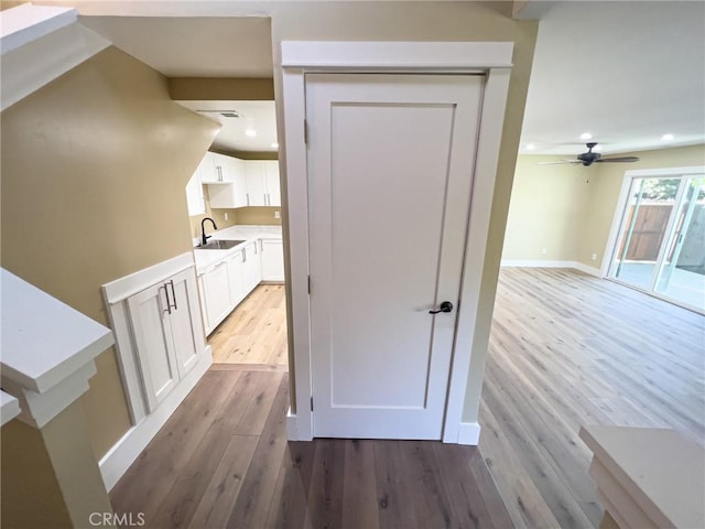 881 Peach St Unit A, San Luis Obispo, CA 93401 - hall with a sink, wood finished floors, baseboards, and recessed lighting