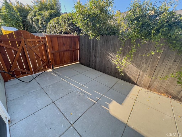 881 Peach St Unit A, San Luis Obispo, CA 93401 - view of patio featuring a gate