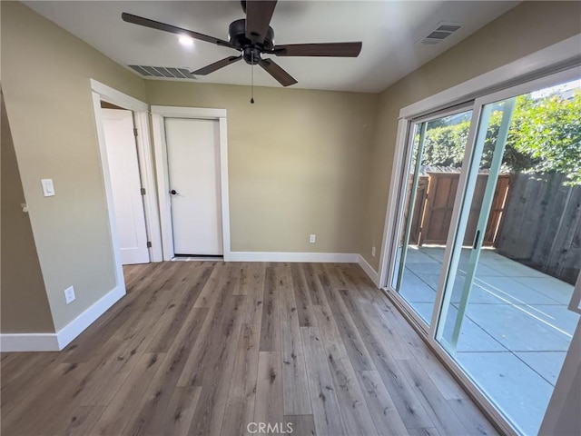 881 Peach St Unit A, San Luis Obispo, CA 93401 - spare room with baseboards, wood finished floors, and a ceiling fan