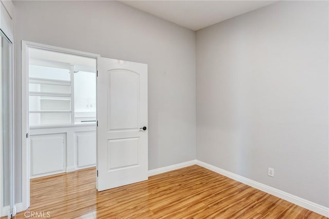 11259 Corsica Ct, Rancho Cucamonga, CA 91730 - unfurnished room with light wood finished floors and baseboards