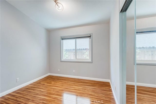 11259 Corsica Ct, Rancho Cucamonga, CA 91730 - spare room with wood finished floors and baseboards