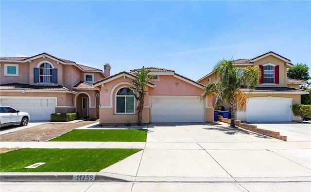 11259 Corsica Ct, Rancho Cucamonga, CA 91730 - mediterranean / spanish house with stucco siding, concrete driveway, a tiled roof, and a front yard