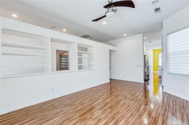 11259 Corsica Ct, Rancho Cucamonga, CA 91730 - unfurnished room featuring ceiling fan, wood finished floors, built in shelves, and recessed lighting
