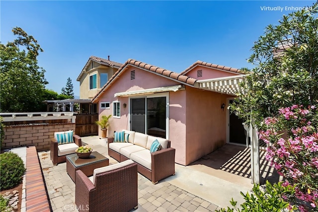 11259 Corsica Ct, Rancho Cucamonga, CA 91730 - back of property featuring a patio, stucco siding, an outdoor hangout area, and a tiled roof