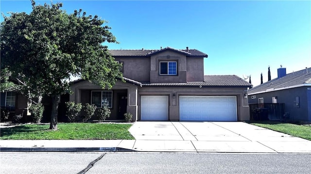 12592 Elton St, Victorville, CA 92392 - traditional home featuring driveway, a tiled roof, stucco siding, a front lawn, and an attached garage