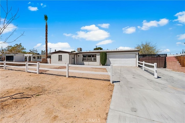 38881 Sage Tree St, Palmdale, CA 93551 - ranch-style house with an attached garage, driveway, and a fenced front yard