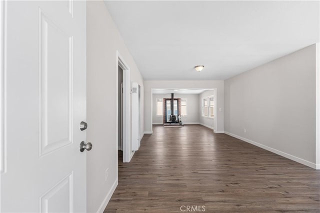 38881 Sage Tree St, Palmdale, CA 93551 - hall featuring baseboards and dark wood-style flooring
