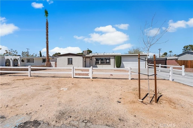 38881 Sage Tree St, Palmdale, CA 93551 - single story home with a garage, a fenced front yard, driveway, and stucco siding