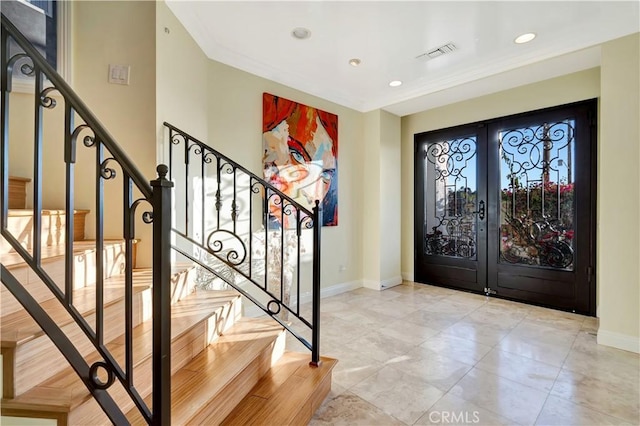 5250 Calatrana Dr, Woodland Hills, CA 91364 - foyer with french doors, stairs, and recessed lighting