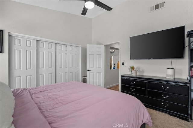 13797 Mesquite Dr, Fontana, CA 92337 - carpeted bedroom with a closet and a ceiling fan