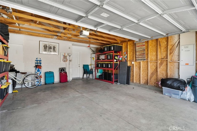 13797 Mesquite Dr, Fontana, CA 92337 - garage featuring a garage door opener