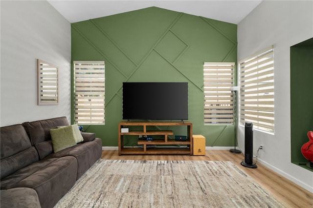 13797 Mesquite Dr, Fontana, CA 92337 - living room featuring wood finished floors, baseboards, and vaulted ceiling