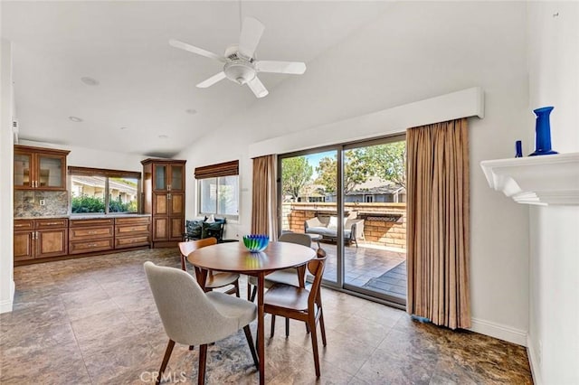 8815 Yuba Cir Unit 1102A, Huntington Beach, CA 92646 - dining area featuring plenty of natural light, high vaulted ceiling, baseboards, and a ceiling fan