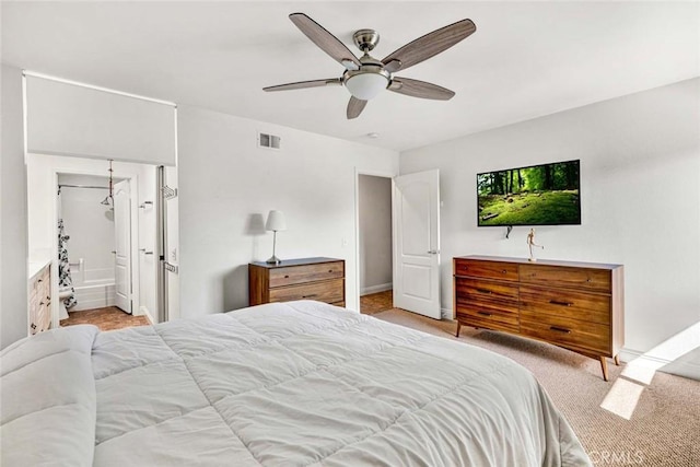 8815 Yuba Cir Unit 1102A, Huntington Beach, CA 92646 - carpeted bedroom featuring a ceiling fan, baseboards, and ensuite bathroom