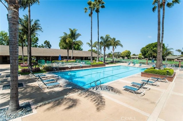 8815 Yuba Cir Unit 1102A, Huntington Beach, CA 92646 - community pool with a patio area