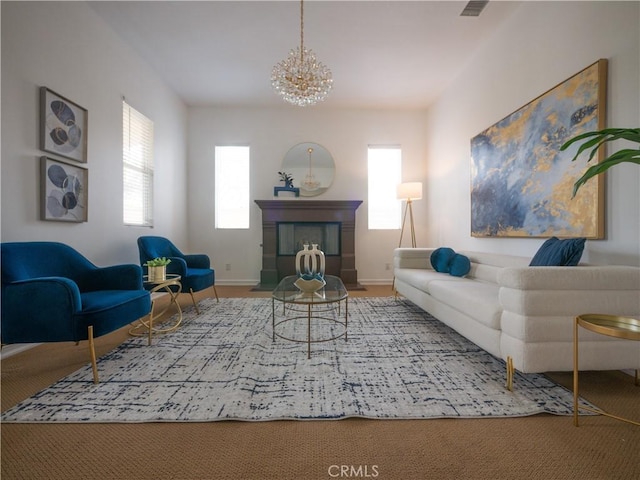 8365 Sanctuary Dr, Corona, CA 92883 - living area featuring a chandelier, baseboards, a fireplace, and carpet