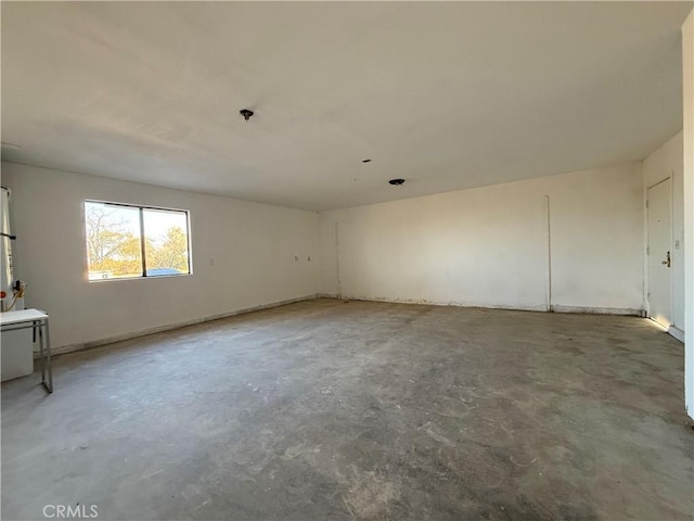 3874 Kreuer Rd, Phelan, CA 92371 - spare room featuring unfinished concrete floors