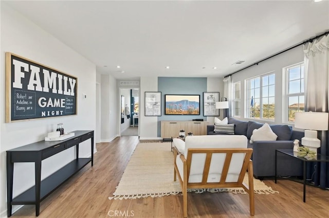41847 Oak Barrel Ct, Palmdale, CA 93551 - living room featuring recessed lighting, wood finished floors, and baseboards