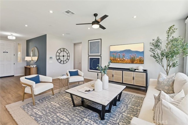 41847 Oak Barrel Ct, Palmdale, CA 93551 - living room with wood finished floors, ceiling fan, recessed lighting, and baseboards