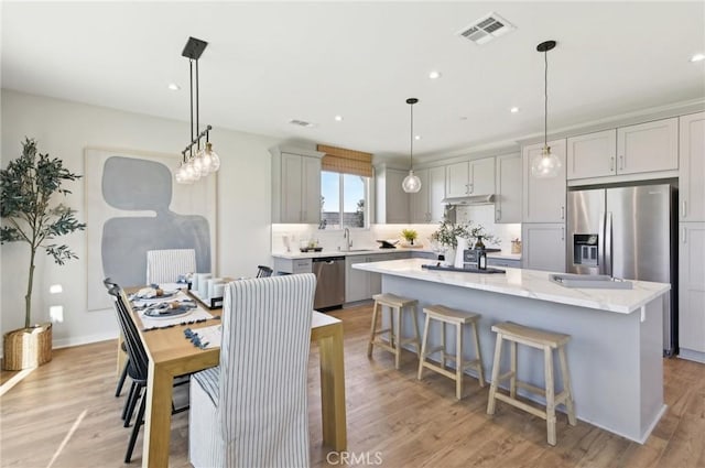 41847 Oak Barrel Ct, Palmdale, CA 93551 - dining room featuring recessed lighting and light wood-style flooring