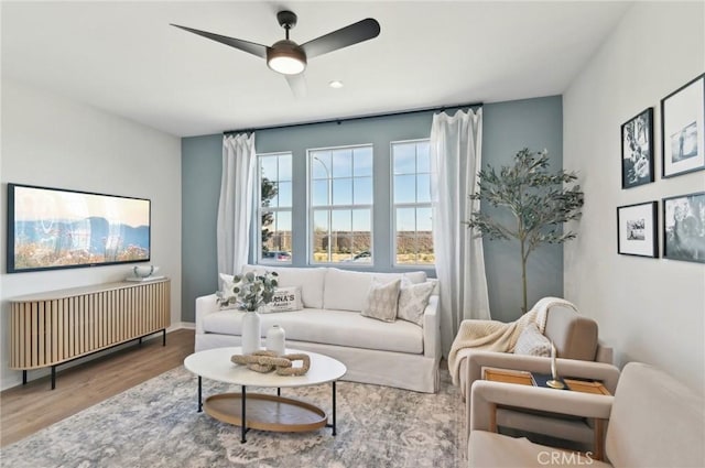 41847 Oak Barrel Ct, Palmdale, CA 93551 - living area featuring wood finished floors, a ceiling fan, recessed lighting, and baseboards