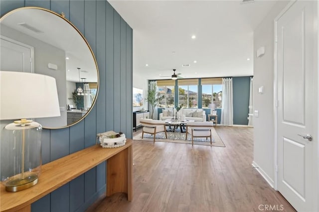 41847 Oak Barrel Ct, Palmdale, CA 93551 - corridor featuring wood finished floors, baseboards, and recessed lighting