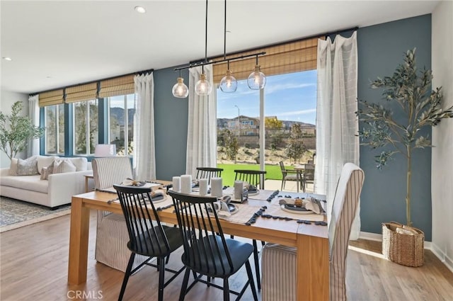 41847 Oak Barrel Ct, Palmdale, CA 93551 - dining room featuring wood finished floors, baseboards, and recessed lighting