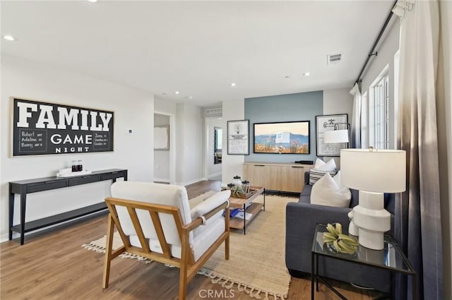 41847 Oak Barrel Ct, Palmdale, CA 93551 - living room featuring light wood-style floors, recessed lighting, and baseboards
