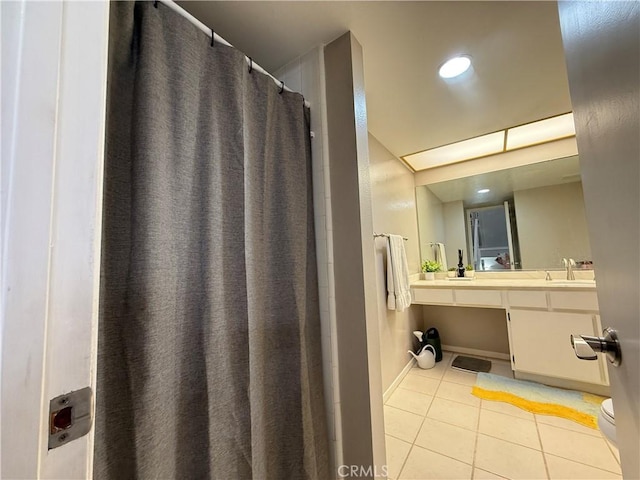 6310 Ridgemar Ct, Rancho Palos Verdes, CA 90275 - full bathroom with tile patterned floors, toilet, vanity, and curtained shower