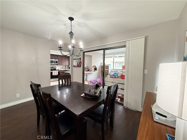 6310 Ridgemar Ct, Rancho Palos Verdes, CA 90275 - dining area featuring a chandelier and dark wood-style floors