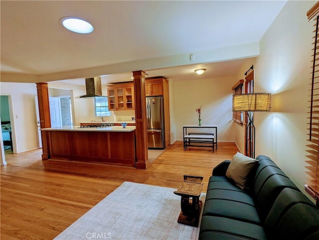 15123 Killion St, Sherman Oaks, CA 91411 - living room with decorative columns and light wood-type flooring